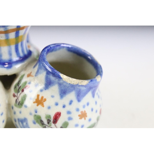 5 - Three pieces of continental faience maiolica ceramics to include a moon flask vase featuring a hare,... 