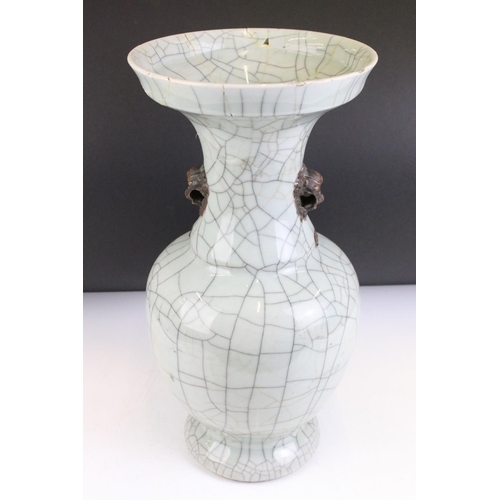 33 - Chinese 19th Century celadon crackle glaze vase together with an 18th Century famille rose teapot wi... 