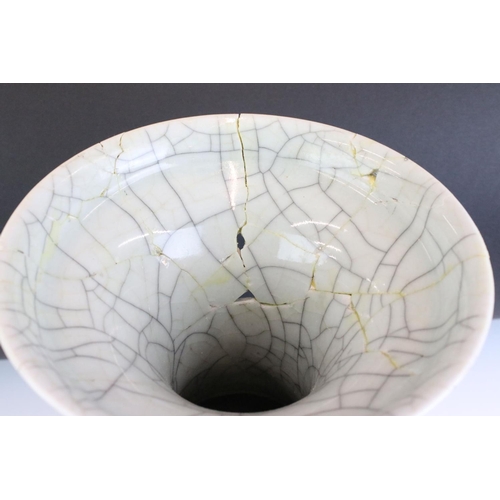 33 - Chinese 19th Century celadon crackle glaze vase together with an 18th Century famille rose teapot wi... 