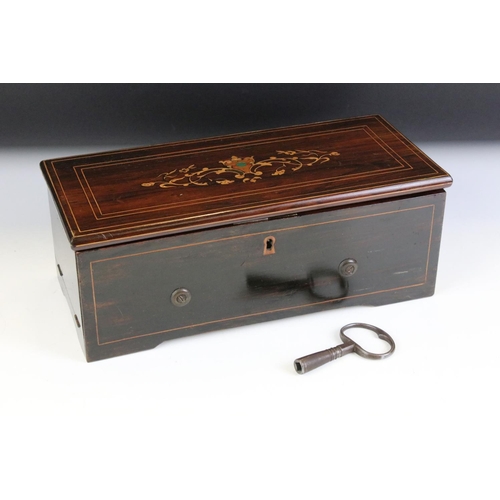 125 - Nicole Freres 19th century 4-airs music box, housed within a rosewood case with box wood inlay to th... 
