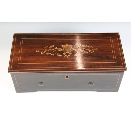 125 - Nicole Freres 19th century 4-airs music box, housed within a rosewood case with box wood inlay to th... 