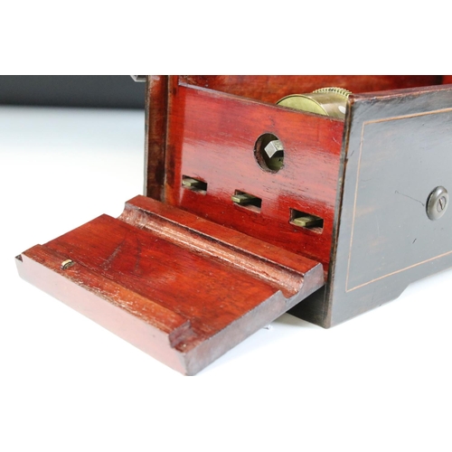 125 - Nicole Freres 19th century 4-airs music box, housed within a rosewood case with box wood inlay to th... 