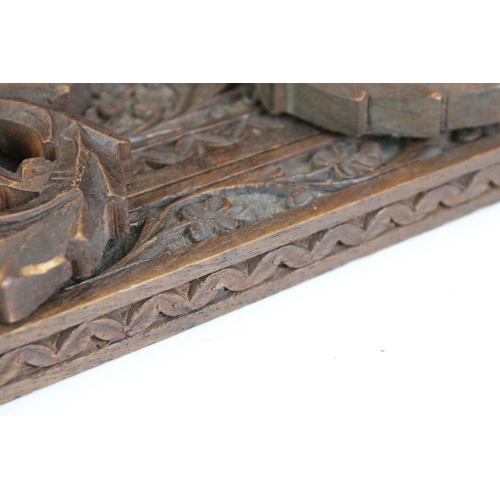 126 - Early 20th Century treen ware book slide having carved folding leaves with extendable base with flor... 
