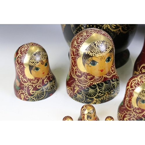 129 - Set of twelve Russian nesting dolls each having hand painted gilt and floral sprays. Twelve pieces i... 