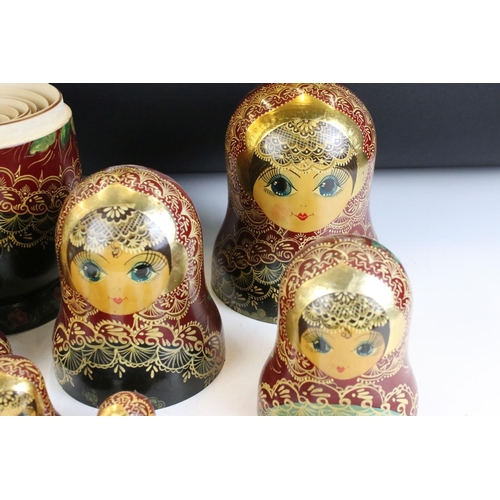 129 - Set of twelve Russian nesting dolls each having hand painted gilt and floral sprays. Twelve pieces i... 