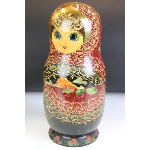 129 - Set of twelve Russian nesting dolls each having hand painted gilt and floral sprays. Twelve pieces i... 
