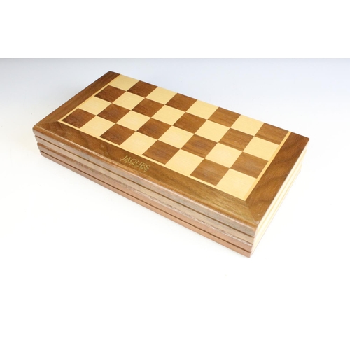 134 - Jaques London folding wooden chess board having a full set of matching turned wooden chess pieces. K... 