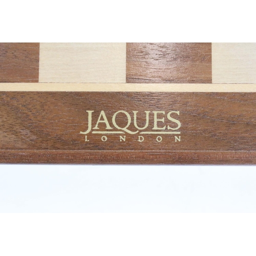 134 - Jaques London folding wooden chess board having a full set of matching turned wooden chess pieces. K... 