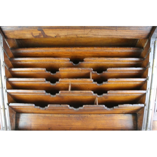 140 - 19th century oak stationery cabinet with fold-out doors, lower drawer with brass drop handle, and in... 