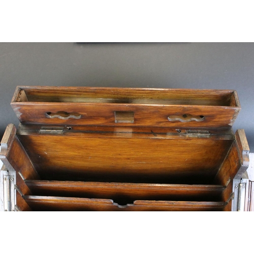 140 - 19th century oak stationery cabinet with fold-out doors, lower drawer with brass drop handle, and in... 