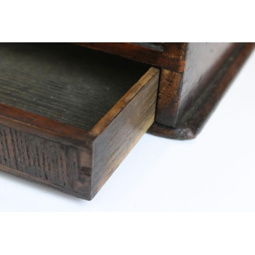 140 - 19th century oak stationery cabinet with fold-out doors, lower drawer with brass drop handle, and in... 