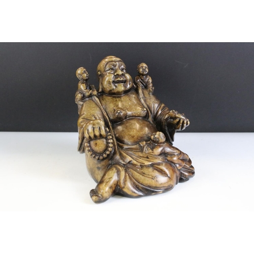 141 - Chinese Carved Stone Chinese Figure in the form of a laughing Buddha depicted with three children, a... 