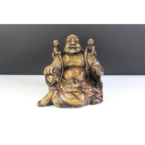 141 - Chinese Carved Stone Chinese Figure in the form of a laughing Buddha depicted with three children, a... 