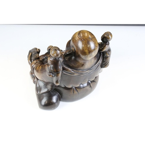 141 - Chinese Carved Stone Chinese Figure in the form of a laughing Buddha depicted with three children, a... 