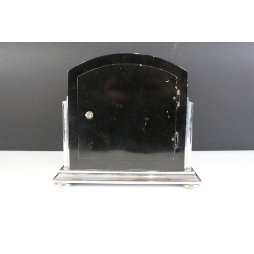 148 - Art Deco chrome & black 'Robertsons of London' domed-top mantle clock, with brass dial, glazed front... 
