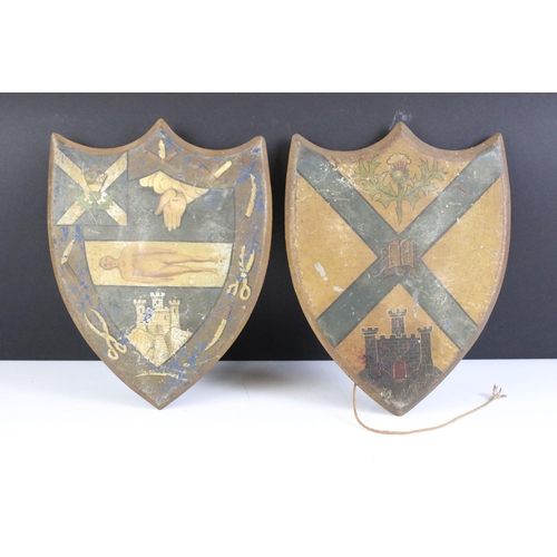 150 - Pair of antique painted metal Scottish shield plaques, each depicting thistles, castles and various ... 