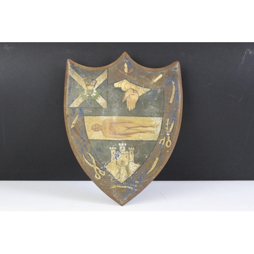 150 - Pair of antique painted metal Scottish shield plaques, each depicting thistles, castles and various ... 