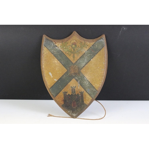 150 - Pair of antique painted metal Scottish shield plaques, each depicting thistles, castles and various ... 