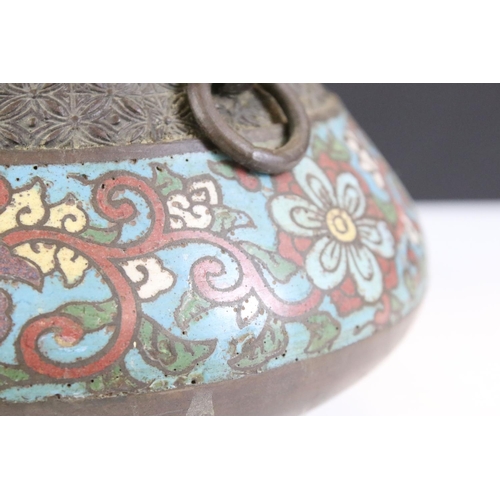 151 - Chinese bronze champleve enamel twin-handled vase of squat baluster form, the enamel bands with flor... 