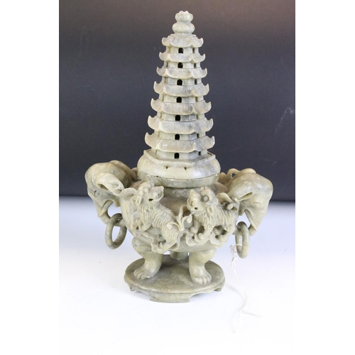 155 - Chinese carved soapstone censer with cover modelled as a pagoda, elephant mask handles and foo dog d... 