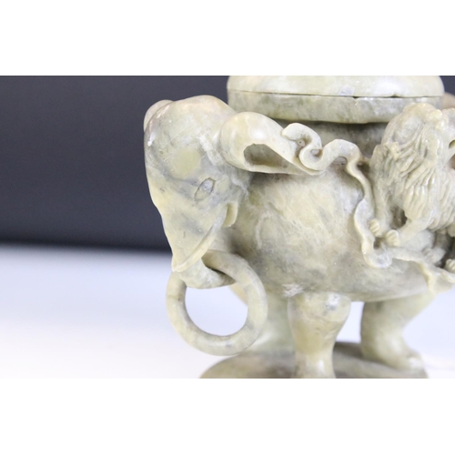 155 - Chinese carved soapstone censer with cover modelled as a pagoda, elephant mask handles and foo dog d... 