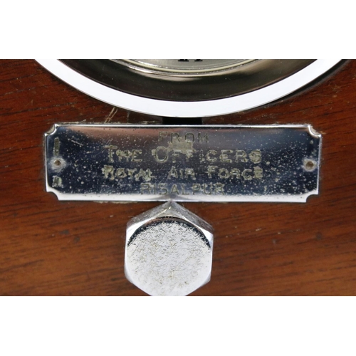 158 - Militaria - A mahogany aeroplane propeller boss clock with central open skeleton silvered dial, pres... 
