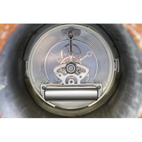 158 - Militaria - A mahogany aeroplane propeller boss clock with central open skeleton silvered dial, pres... 