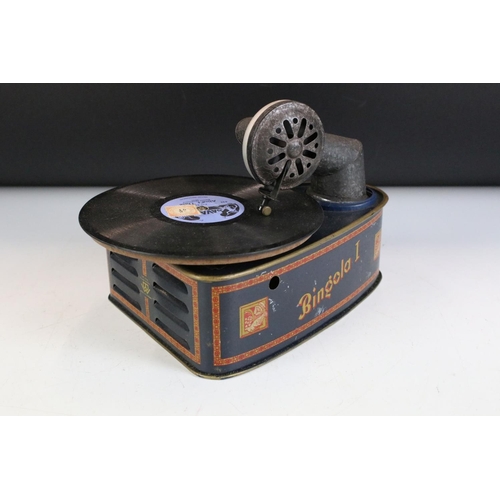 160 - German Bingola I tinplate clockwork polyphon / gramophone (approx 18cm long), with key and two assoc... 