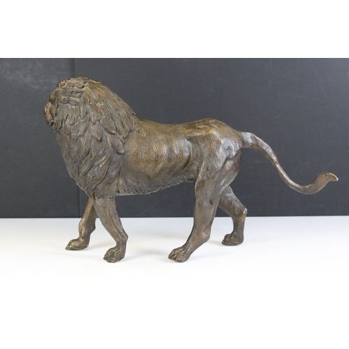 171 - 20th Century hollow cast bronze figurine in the form of a lion having moulded details. Measures appr... 