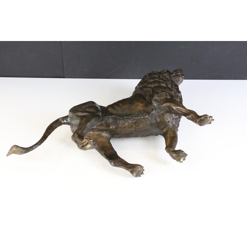 171 - 20th Century hollow cast bronze figurine in the form of a lion having moulded details. Measures appr... 