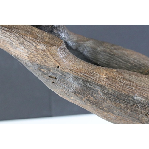 173 - Jude Lamb - Late 20th Century carved oak sculpture in the form of a leaping hare raised on a natural... 