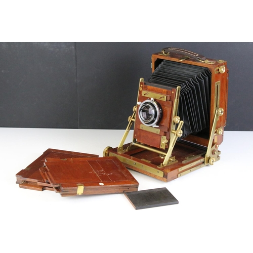 179 - Gandolfi wooden and brass plate folding camera and slides. Lens marked Schneider- Kreuznach Xenar 1:... 