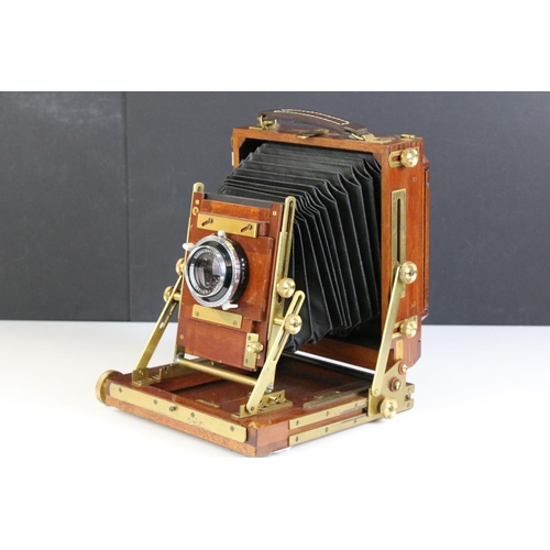 179 - Gandolfi wooden and brass plate folding camera and slides. Lens marked Schneider- Kreuznach Xenar 1:... 