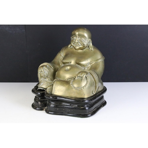 180 - Chinese hollow cast brass seated laughing Buddha figurine depicted holding a string of beads to one ... 