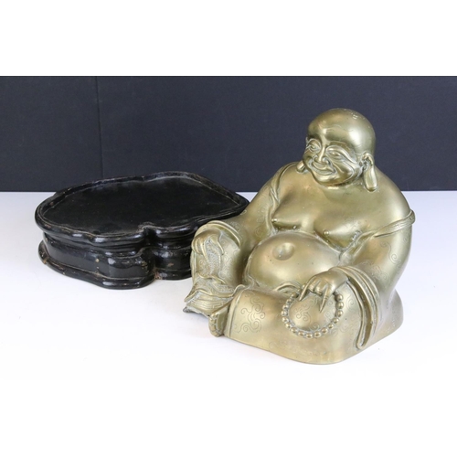 180 - Chinese hollow cast brass seated laughing Buddha figurine depicted holding a string of beads to one ... 
