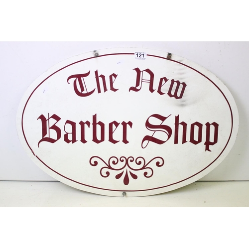 121 - ' The New Barber Shop ' hanging sign, of oval form, with burgundy lettering on a white ground, measu... 