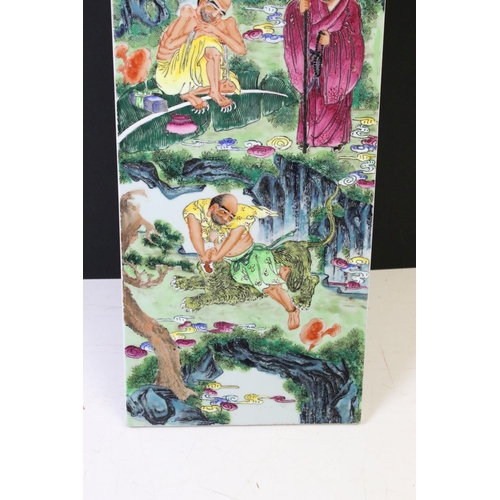 34 - Chinese ceramic wall plaque hand painted with five deities within a landscape scene. Unsigned. Measu... 