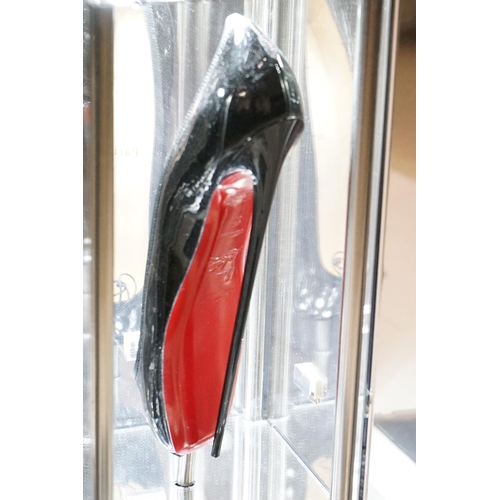 124 - Christian Louboutin - Pair of Shop Display Chrome and Glass Mirrored Display Stands, each housing an... 