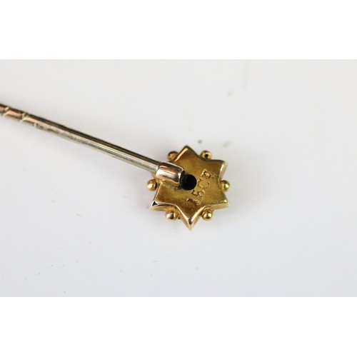 100A - Five tie pins to include diamond 15ct gold pin, small rose cut diamond, the stick broken, a seed pea... 