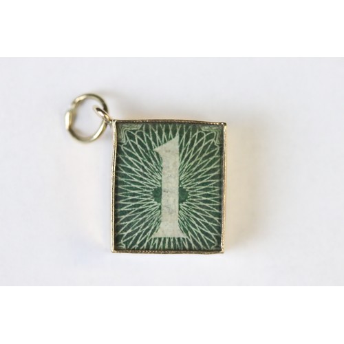 70 - Three 9ct yellow gold charms, an 8ct gold charm, a 14ct enamelled charm and a yellow metal charm (6)