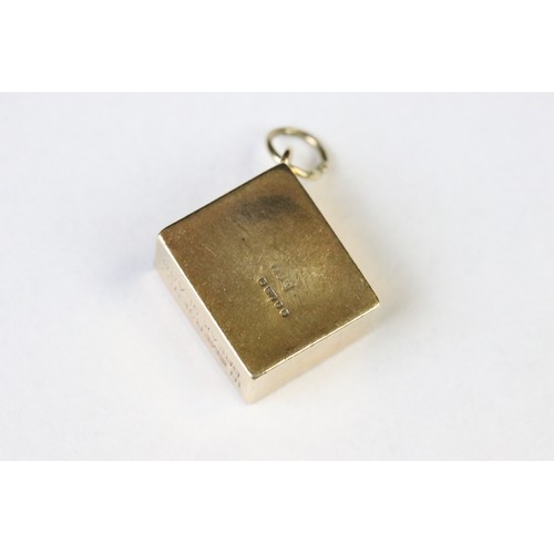 70 - Three 9ct yellow gold charms, an 8ct gold charm, a 14ct enamelled charm and a yellow metal charm (6)