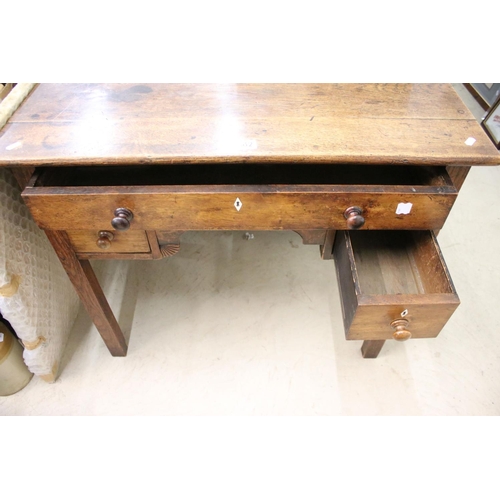 495 - George III Oak Lowboy or Side Table, with an arrangement of three drawers and shaped apron, raised o... 