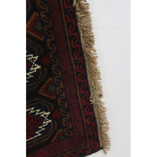 503 - New Baluchi Woollen Rug, 142cm x 80cm