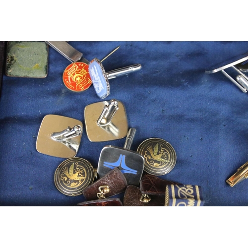 301 - A collection of mixed cufflinks to include hallmarked silver examples together with tie clip and tie... 