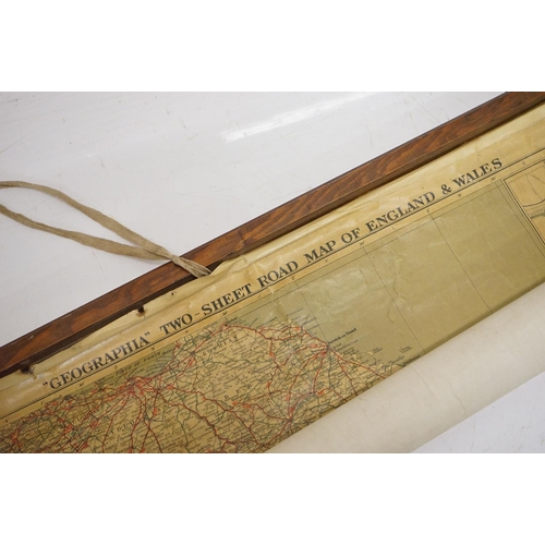 419 - 'Wool in the United Kingdom' rolled poster, wooden support bars and ties, 139 x 91cm and a 'Geograph... 