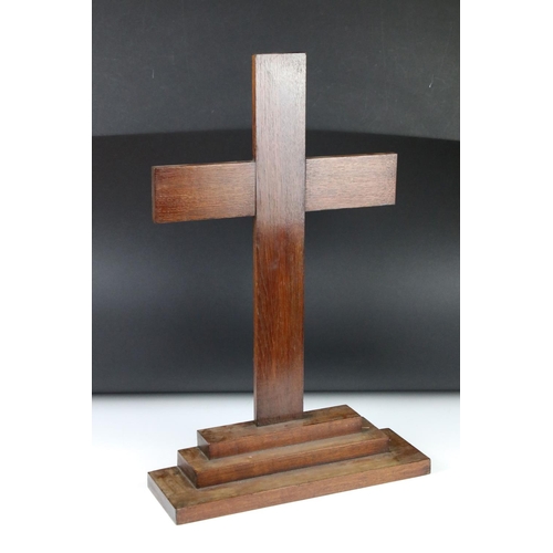 174 - Wooden cross mounted on a stepped base, 59cm high