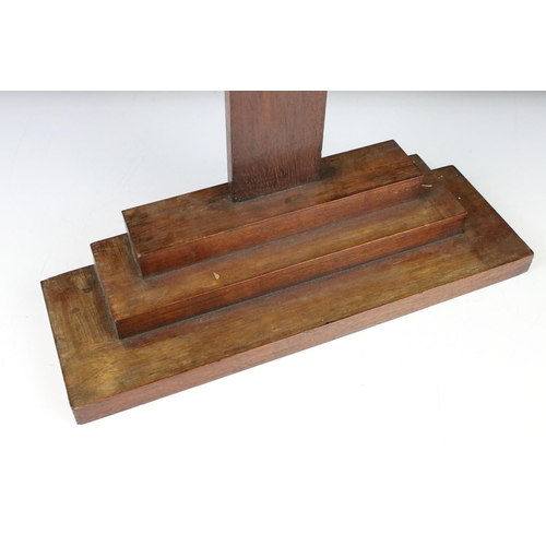 174 - Wooden cross mounted on a stepped base, 59cm high