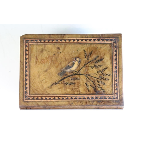 122 - Italian carved olive wood puzzle box inlaid with marquetry bird. Measures approx 13.5cm wide