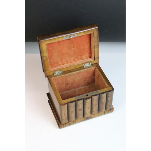 122 - Italian carved olive wood puzzle box inlaid with marquetry bird. Measures approx 13.5cm wide