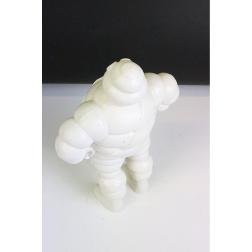 128 - Advertising - A cast iron Michelin man figure, marked 'Reg. 67548 Detroit' to reverse (approx 15cm h... 